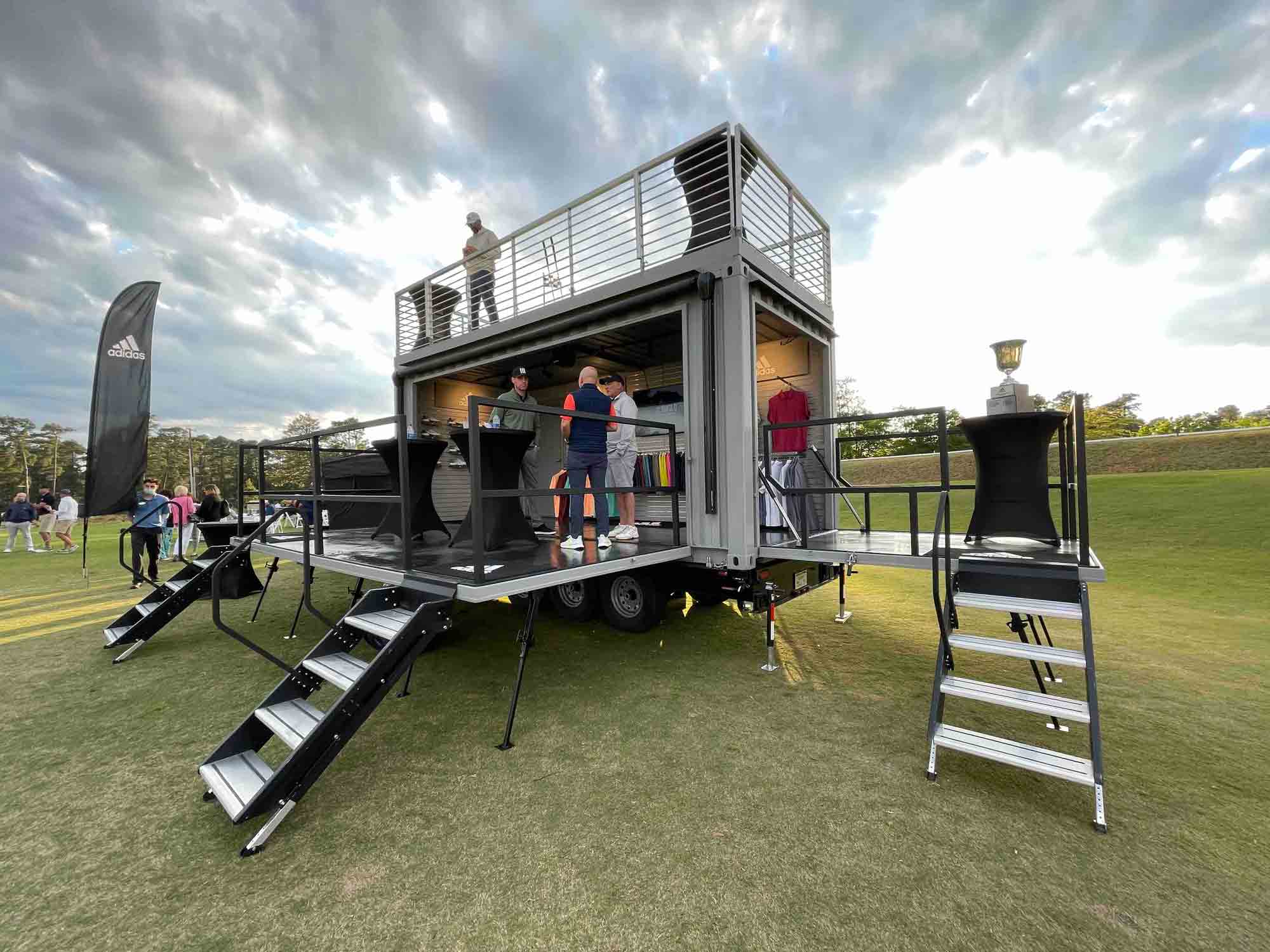 Front view of ROXBOX Containers' custom Adidas Golf PGA Tour shipping container mobile experiential marketing activation.