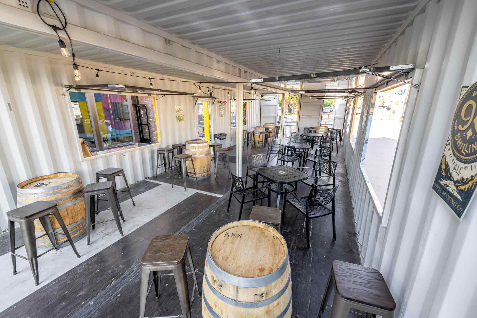 Inside Odell Brewing Co.'s custom shipping container patio in the RiNo Art District of Denver, Colorado, built by ROXBOX Containers.