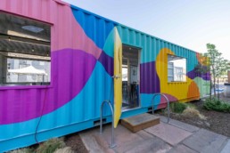 Custom mural on Odell Brewing Co.'s custom shipping container patio in the RiNo Art District of Denver, Colorado, built by ROXBOX Containers.
