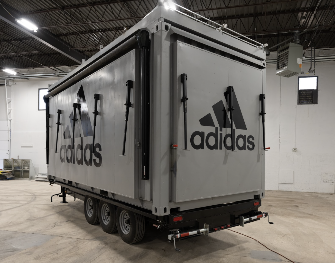 ROXBOX Containers' custom Adidas Golf PGA Tour shipping container mobile experiential marketing activation.