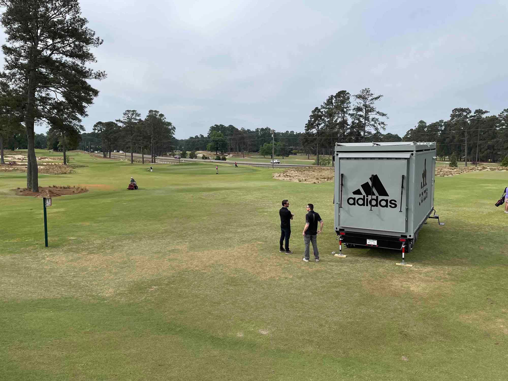 Closed view of ROXBOX Containers' custom Adidas Golf PGA Tour shipping container mobile experiential marketing activation.