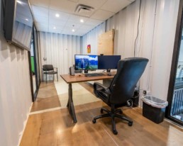 Inside view of a shipping container office in Eldorado Climbing Walls shipping container office space built by ROXBOX Containers.