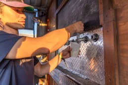 Custom shipping container bar built by ROXBOX Containers for Two Parts Denver.