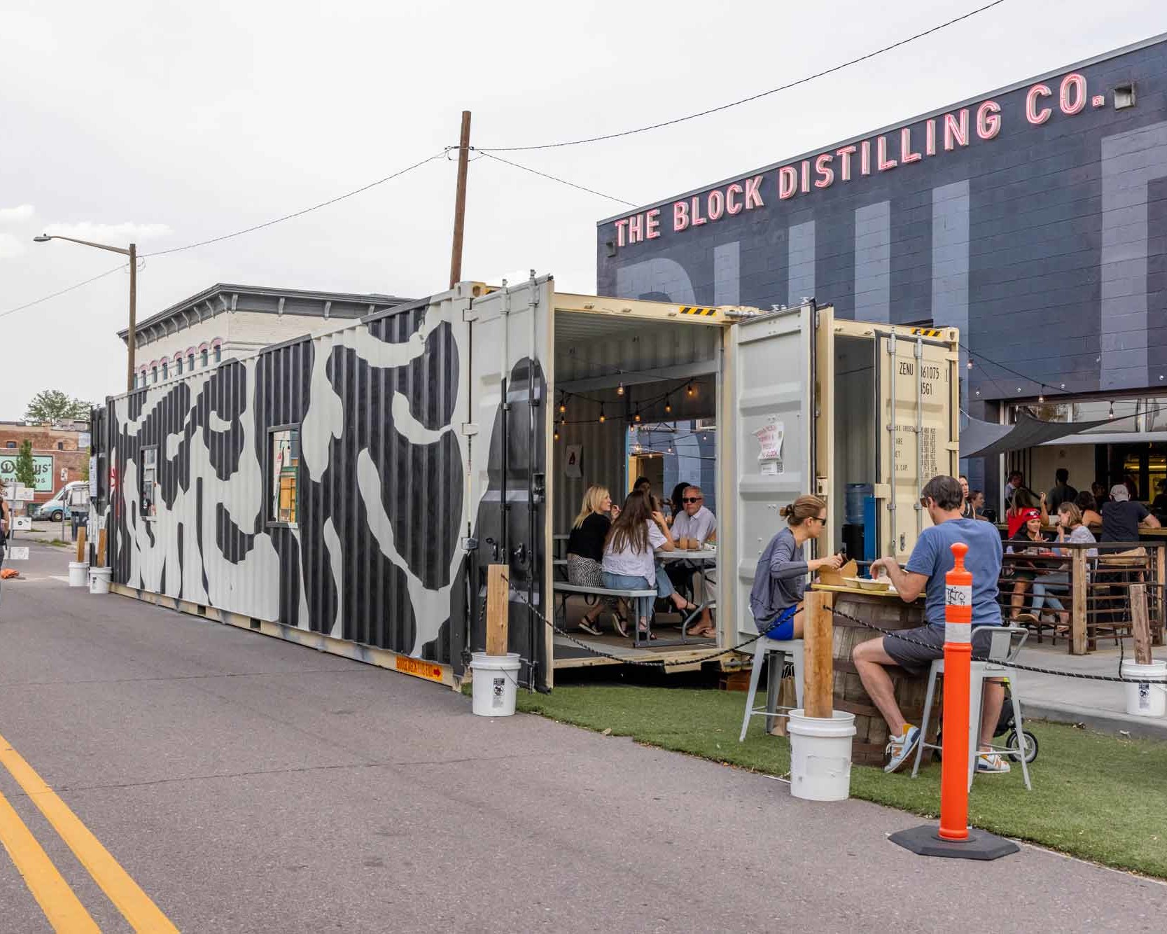 The Block Distilling Company custom shipping container patio seating area built by ROXBOX Containers.