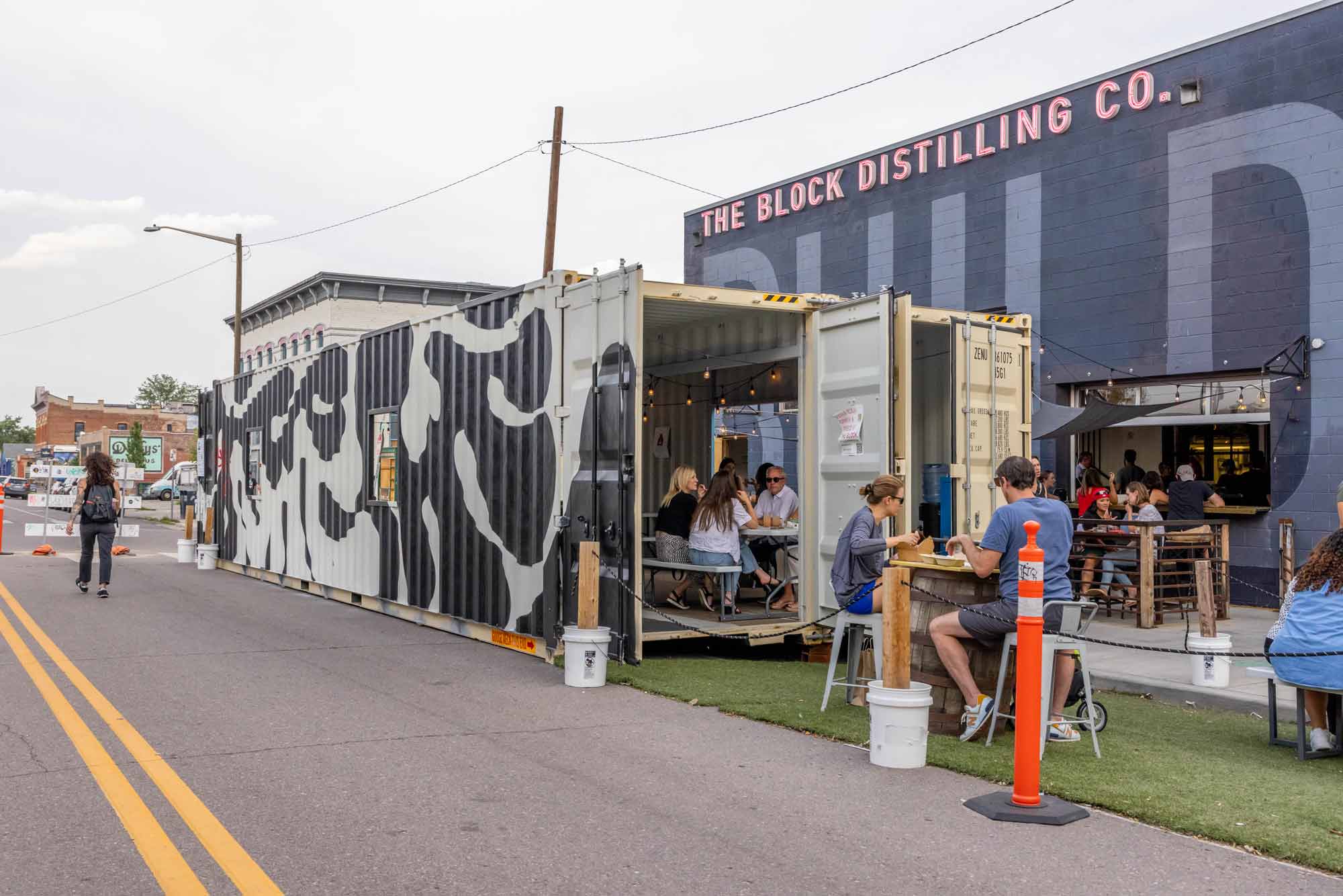 The Block Distilling Company custom shipping container patio seating area built by ROXBOX Containers.