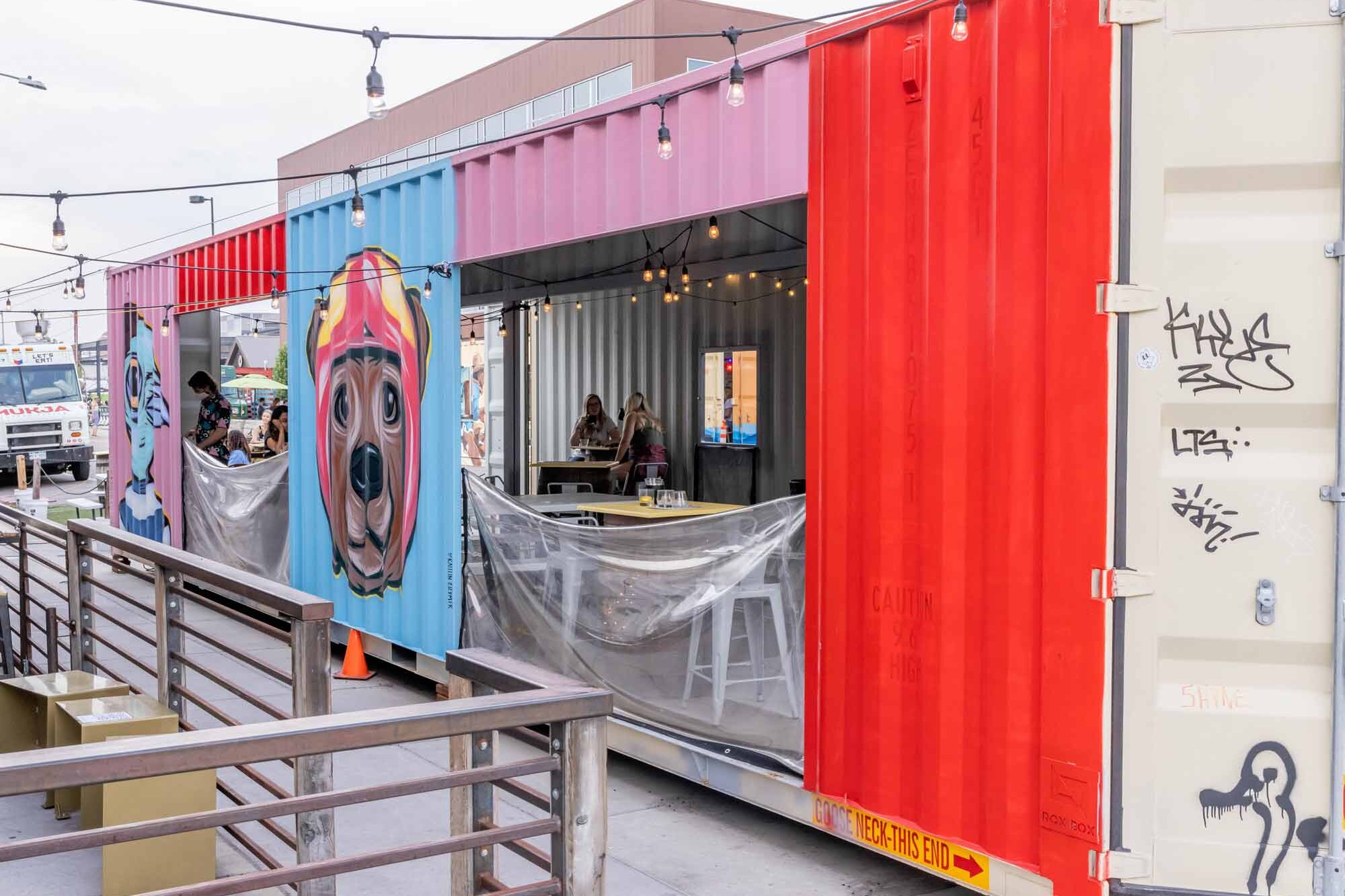 The Block Distilling Company custom shipping container patio seating area built by ROXBOX Containers.