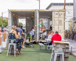 The Block Distilling Company custom shipping container patio seating area built by ROXBOX Containers.