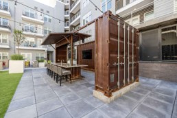 Price Development Group custom shipping container patio bar built by ROXBOX Containers.