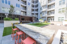Price Development Group custom shipping container patio bar built by ROXBOX Containers.