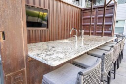 Price Development Group custom shipping container patio bar built by ROXBOX Containers.