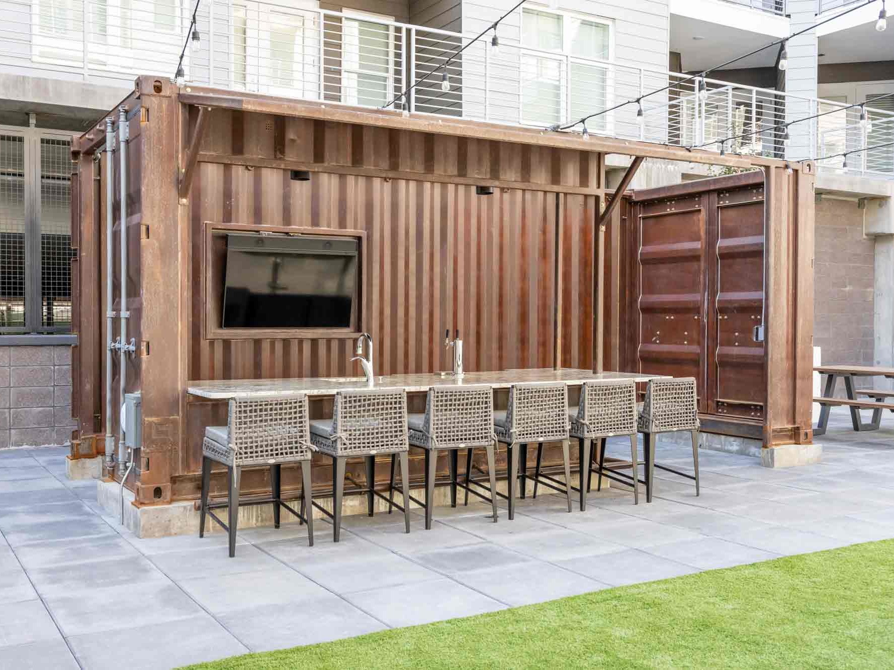 Price Development Group custom shipping container patio bar built by ROXBOX Containers.