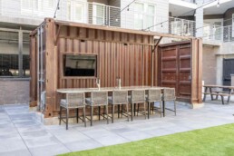 Price Development Group custom shipping container patio bar built by ROXBOX Containers.