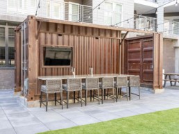 Price Development Group custom shipping container patio bar built by ROXBOX Containers.