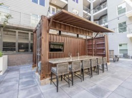 Price Development Group custom shipping container patio bar built by ROXBOX Containers.