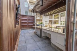 Price Development Group custom shipping container patio bar built by ROXBOX Containers.