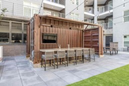 Price Development Group custom shipping container patio bar built by ROXBOX Containers.