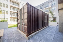 Price Development Group custom shipping container patio bar built by ROXBOX Containers.