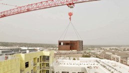 Price Development Group's custom shipping container patio bar built by ROXBOX Containers being delivered into location.