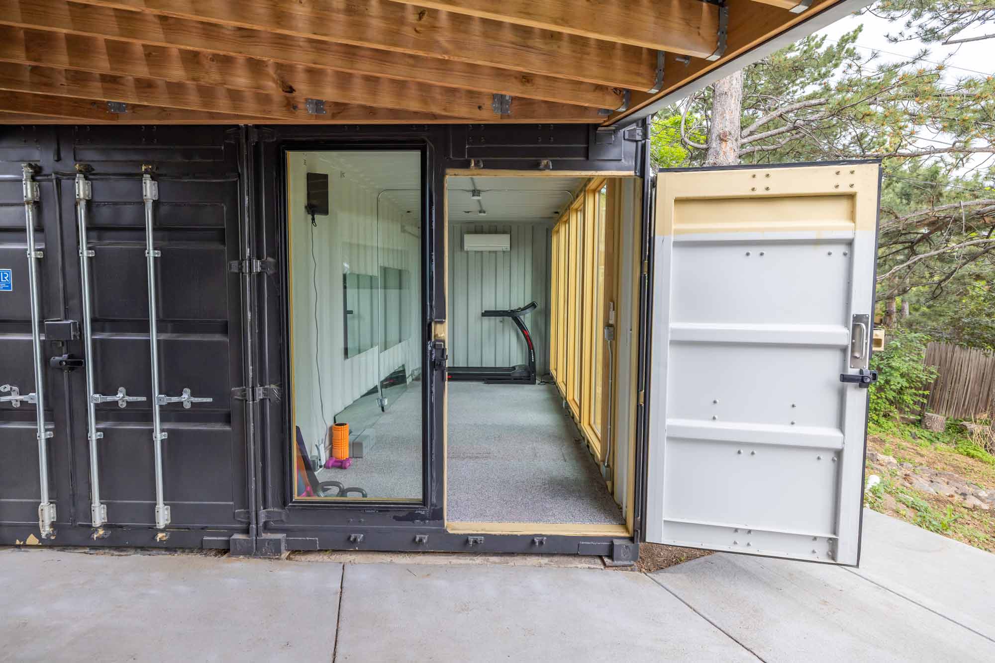 https://www.roxboxcontainers.com/wp-content/uploads/2022/06/B17-Bruder-Design-House-Garage-for-Web.jpg